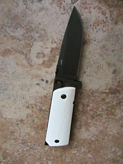 D&L Sports™ knife with 1911 pistol grip handle