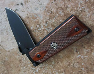 D&L Sports™ knife with 1911 pistol grip handle