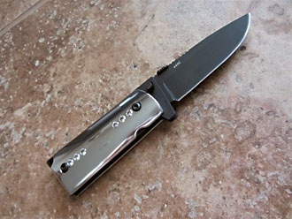 D&L Sports™ knife with 1911 pistol grip handle