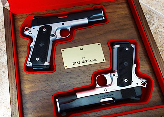 pair of 1911s in custom display case